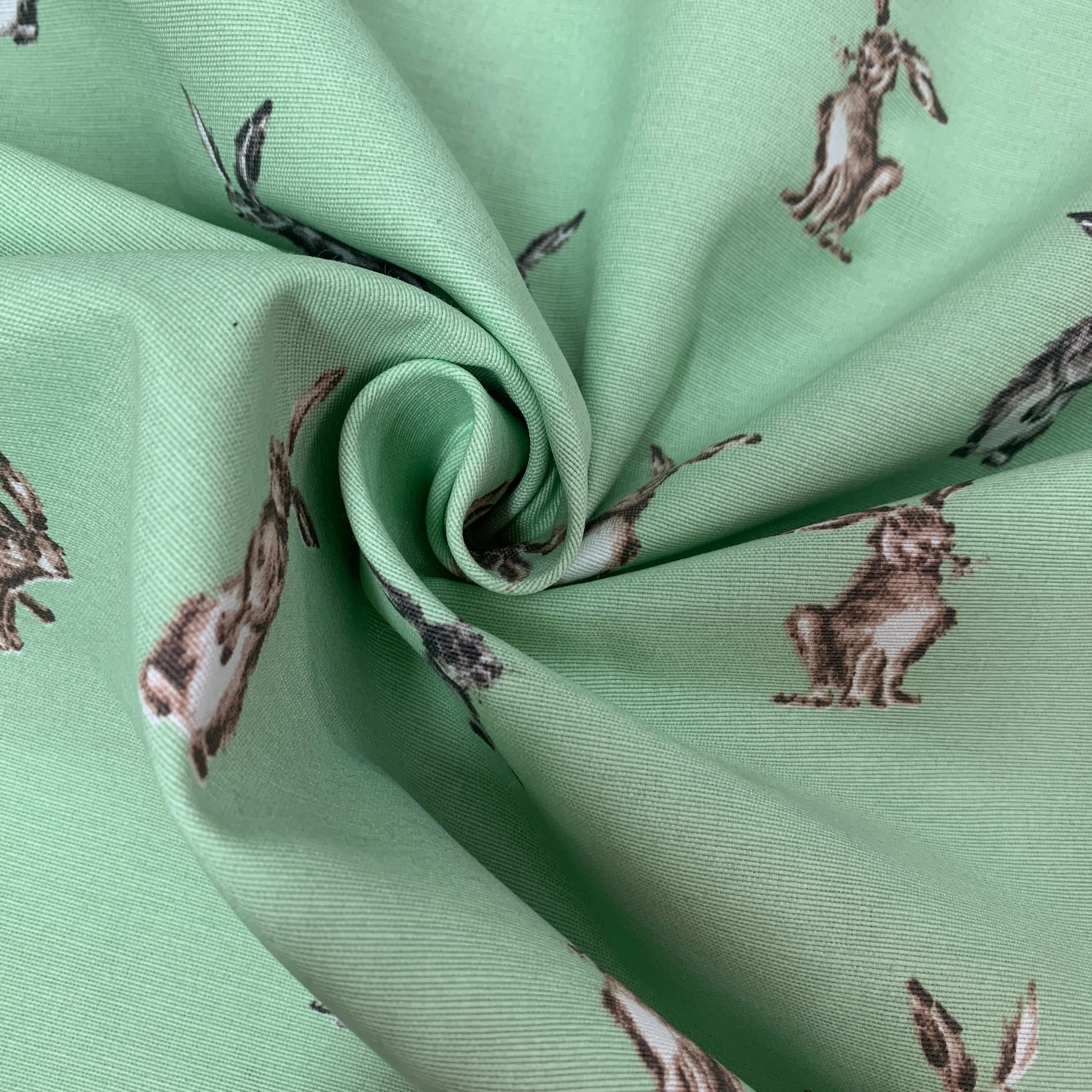 Hares (Green) Printed Canvas Fabric